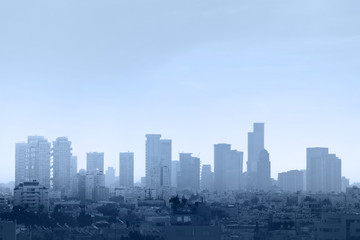 Fototapeta premium Blue tone city scape. Cityscape, modern building on a blue background. City blurred morning abstract background. Dawning. 