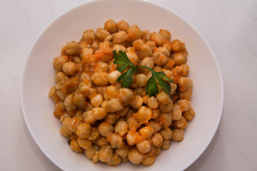 Cooking chickpeas bowl stone background top view