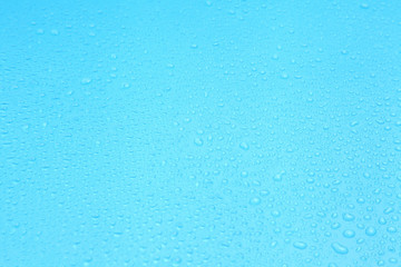 Close up water drops on blue background, Water drop in macro photography