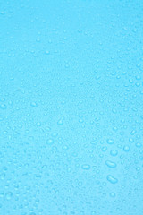 Close up water drops on blue background, Water drop in macro photography