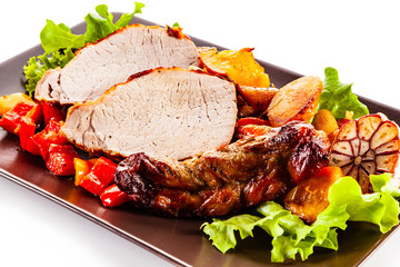 Roast chicken steaks and vegetable salad