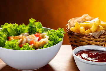 Fried cod and vegetables with french fries