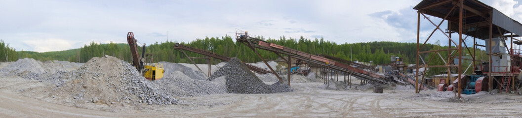 Fototapeta na wymiar Big old industrial machinery at the quarry.