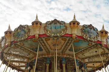 Colorful city carousel for children. Touristic concepts in Nouvelle Aquitaine. Time to get fun with children.