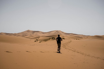 Fototapeta na wymiar Running in the desert