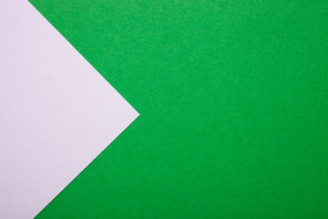 White and green paper texture as background with place for text