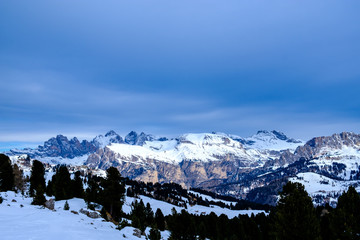 Stormy clouds in italian dolomites in a snowy winter