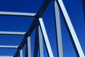 Closeup photo of a riveted steel seam of an iron bridge