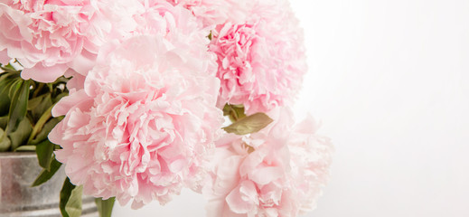 Delicate beautiful pink bouquet of peonies closeup, wedding card, invitation, romantic image.