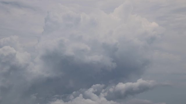Timelapse video of dark storm clouds rolling in showing climate change and global warming concept