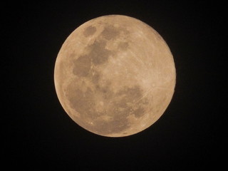 Super Blue Blood Moon at night March, 31, 2018, view of full moon rise up in dark sky background taken in Thailand, Asia.