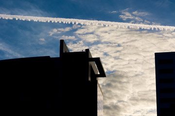 Blue sky with Condensation Trails by jet engine.