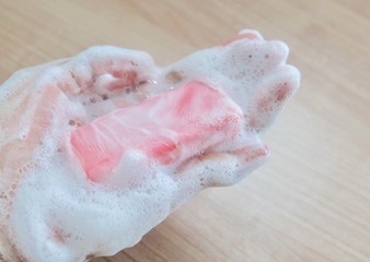 Close Up Woman Hand with Soap Bar