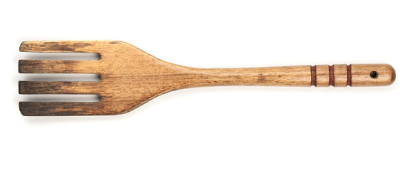 top view of old wooden fork on isolated background