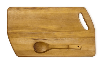 wooden spoon on a wooden kitchen board against a white background