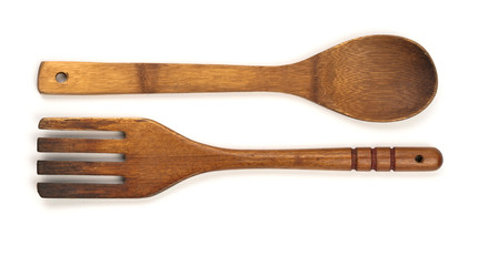 Wooden Spoon and fork isolated on a white background.