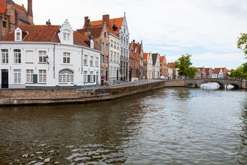 Naklejka premium Langerei Canal winding through town of Brugge, Bruges, Belgium