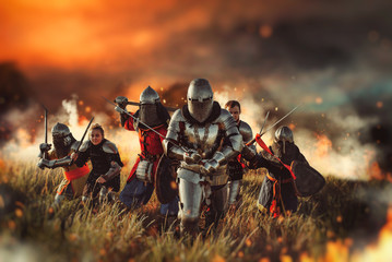 Medieval knights on battle field - obrazy, fototapety, plakaty