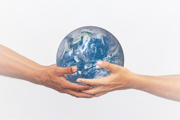 The man gives planet Earth to teenagers on white background . Ecology concept, earth day. Elements of this image furnished by NASA