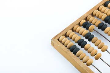 Vintage wooden abacus on a white background with copy space.