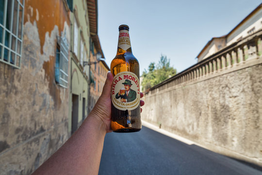 Moretti beer in hand in Montopoli in Val d'Arno, Italy.