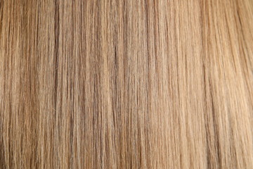 background of female brown hair close up