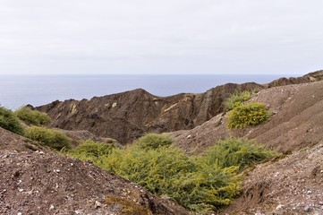 Fototapeta na wymiar Panoramic view of the Atlantic Ocean behind a desertic place in Porto Santo (Madeira Islands, Portugal)