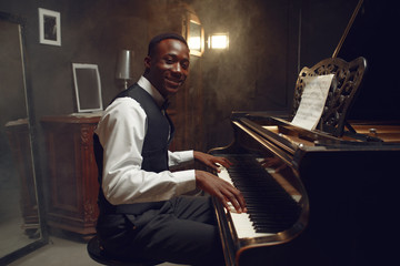 Black grand piano player, jazz performance