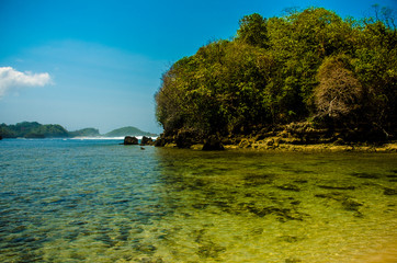 tropical island in the sea, Kondang Merak Beach, Malang, East Java, Indonesia