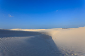 Fototapeta na wymiar White sand dunes panorama from Lencois Maranhenses National Park, Brazil.