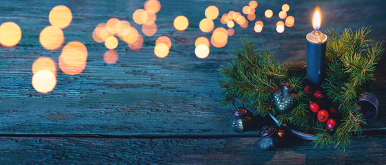 Background with candle and christmas ornaments