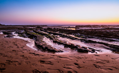 Rock formations on the beach in Algarve, Portugal