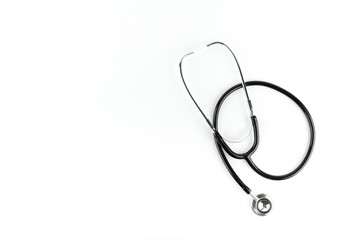 black stethoscope on a white background with copy space.