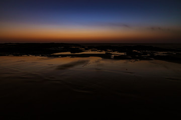 Evening twilight on the beach in Algarve, Portugal