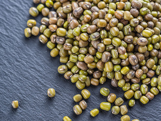 Mash soy bean grains are on the surface of the shale.