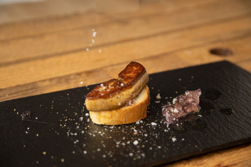 Spanish foie tapa with lilac sauce and bread