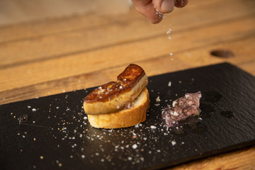 Spanish foie tapa with lilac sauce and bread