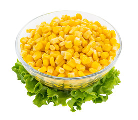 Canned sweet corn in a glass bowl. Side dish and ingredient for salads. Isolated on a white background. Vegetarian.
