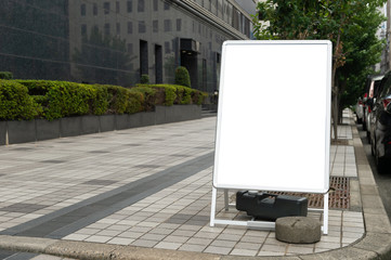 Large blank billboard on a street wall, banners with room to add your own text