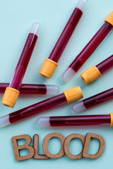 vacuum tubes with blood and the word blood written