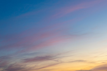 Fototapeta premium Yellow sunset sky and pink clouds.