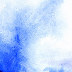 Background with blue watercolor texture on textured paper
