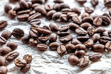 Roasted coffee beans on white background