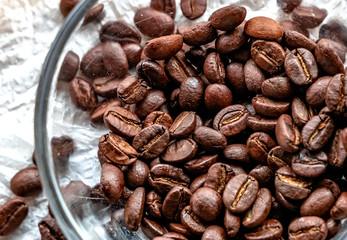 Roasted coffee beans on white background