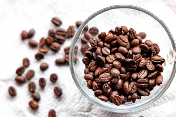 Roasted coffee beans on white background
