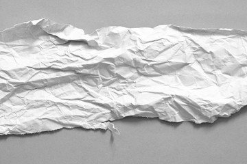 torn paper on gray background with copy space for text