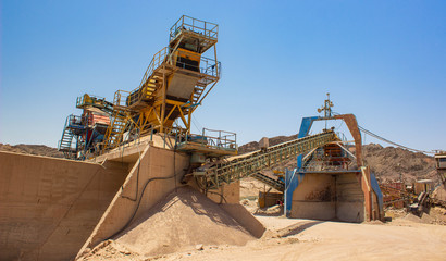 heavy machinery industrial equipment for digging in desert quarry place  