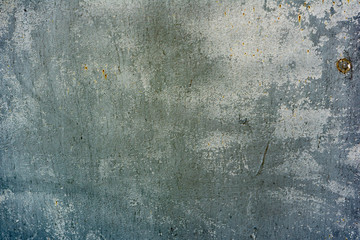 Texture of a concrete wall with cracks and scratches which can be used as a background