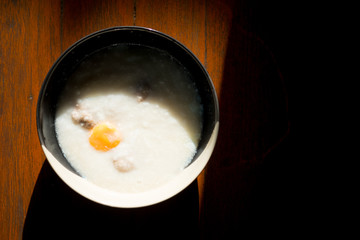 Boiled rice pork or mush with egg for Thai style breakfast