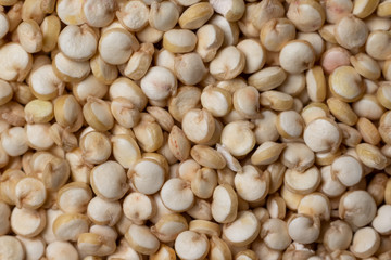 Real quinoa flat lay macro photography. Uniform background texture.